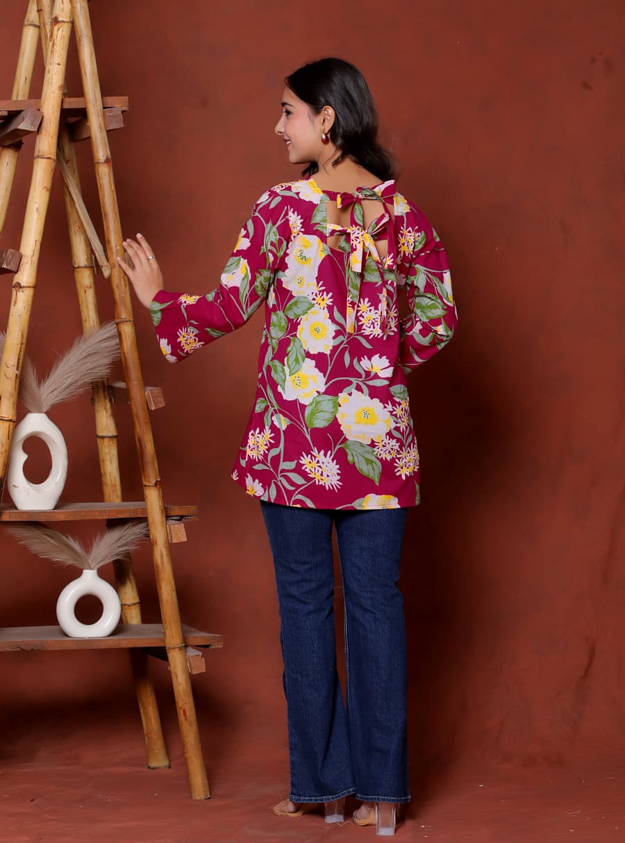 Elevate your ethnic wardrobe with this chic and vibrant fuchsia pink blue skay green  kurti. Featuring a striking white lily print, this piece is designed for the modern woman who loves a mix of classic charm and edgy details.(RRRD40