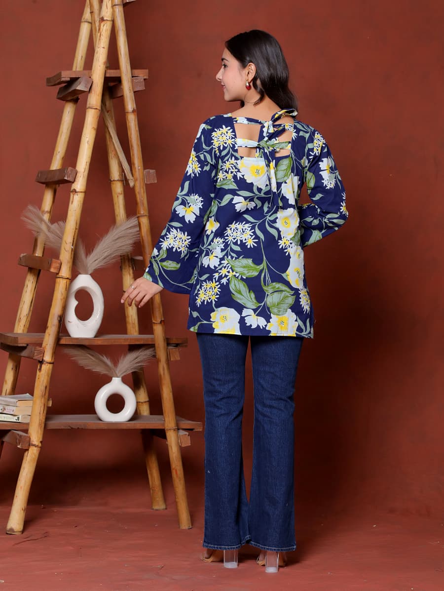 Elevate your ethnic wardrobe with this chic and vibrant fuchsia pink blue skay green  kurti. Featuring a striking white lily print, this piece is designed for the modern woman who loves a mix of classic charm and edgy details.(RRRD40