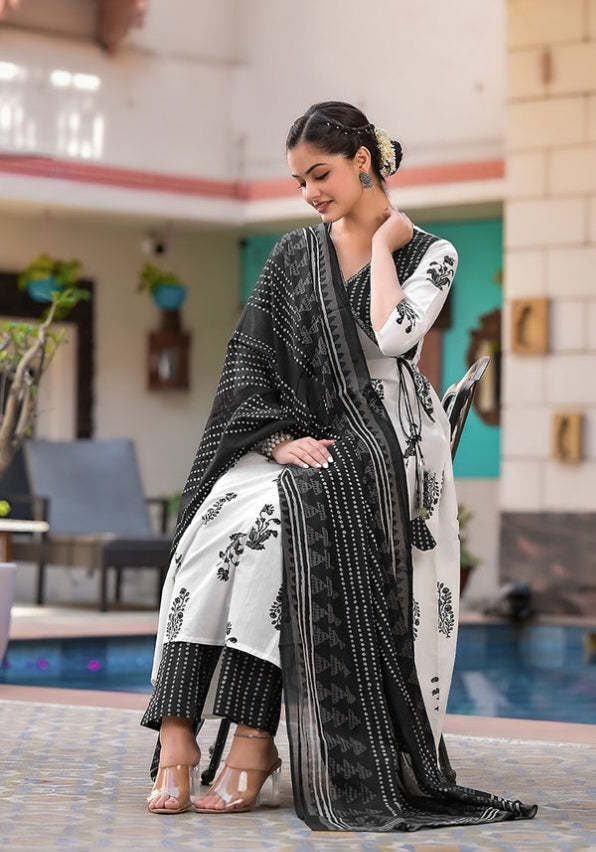 For a Festive gathering, you'll can opt for black white ANGRAKHA set which is decorated with finest self .It is paired with matching dupatta